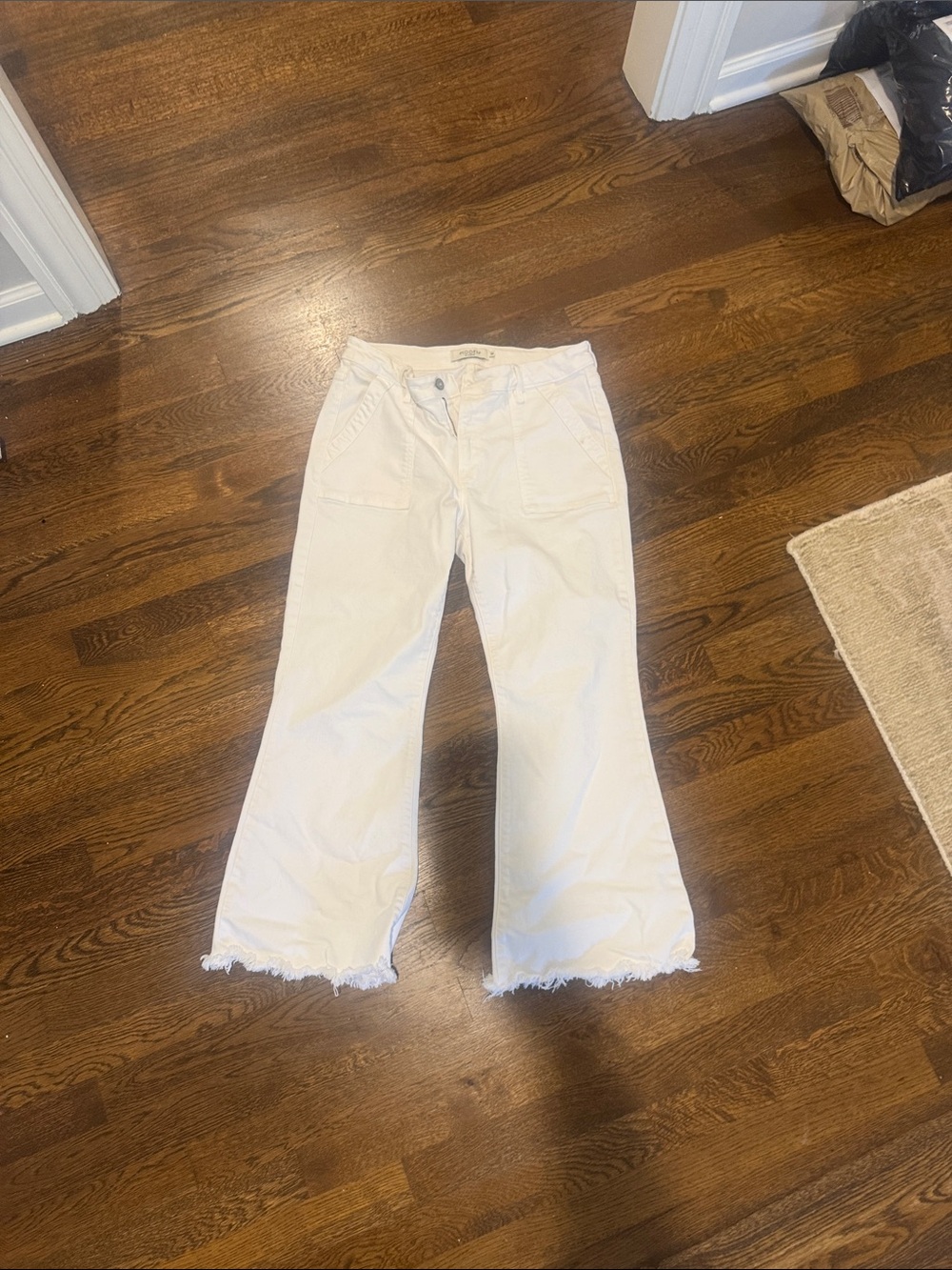 Women's White Flare Jeans with Frayed Hem